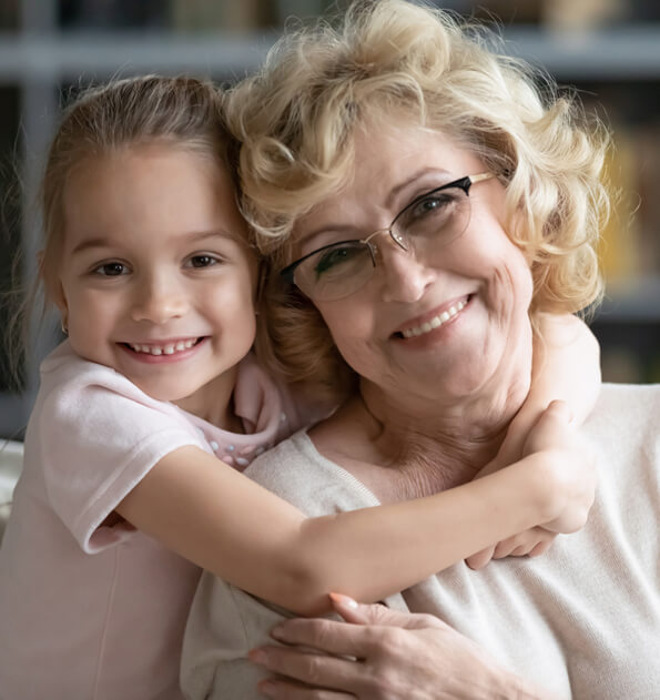 Smiling grandma and granddaughter