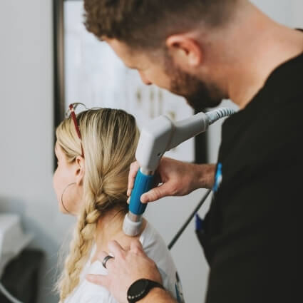 soft tissue therapy on womans neck