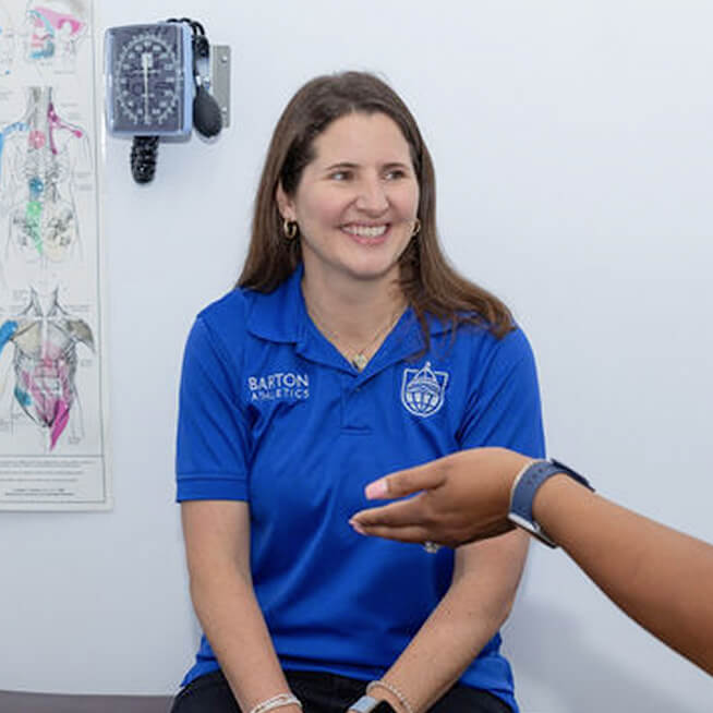 Smiling woman wearing a blue shirt