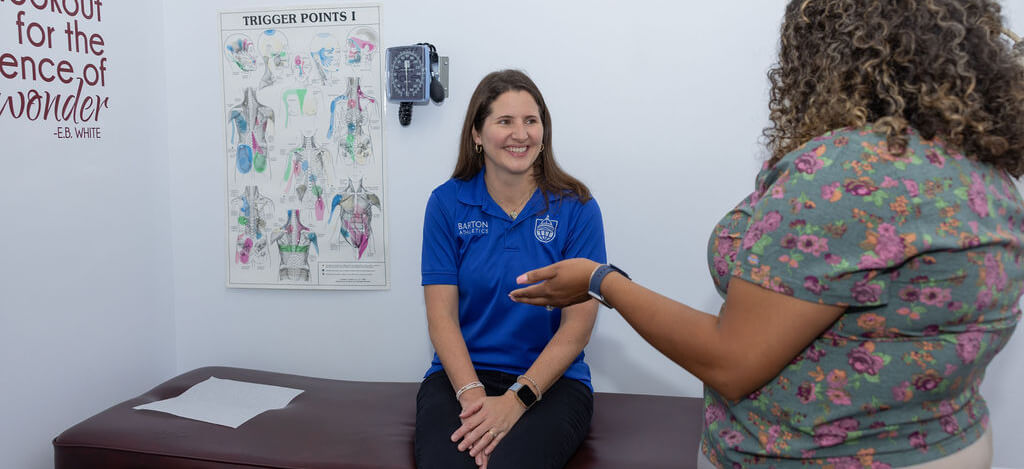 Mobile patient in a consultation at Discover Chiropractic Center