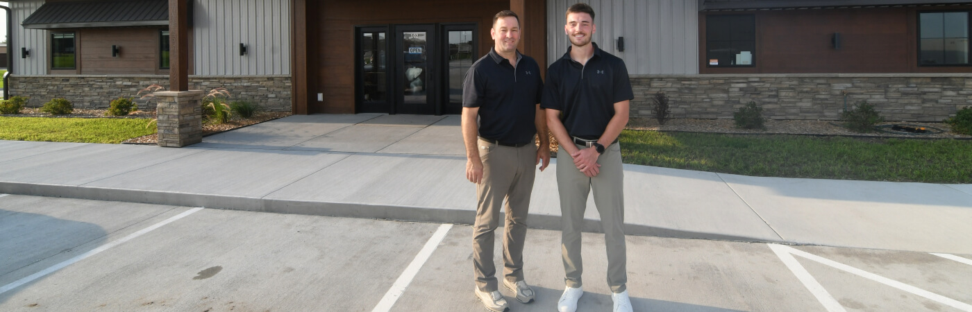 Gilbert chiropractors standing outside the office