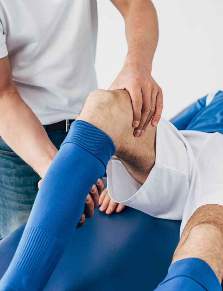 Female patient receiving chiropractic treatment for her neck