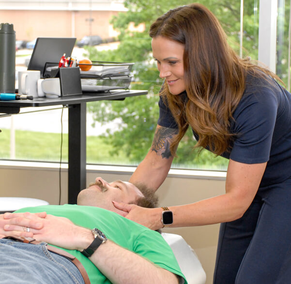 Chesterfield chiropractor adjusting a patient's neck