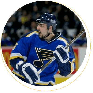 Jamie Rivers shooting a hockey puck