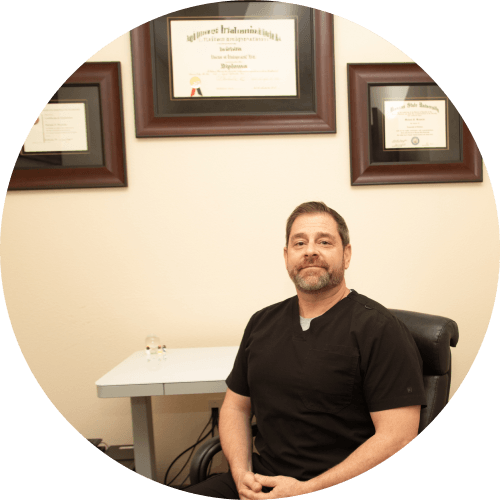 Allen chiropractor Dr Michael with certificates