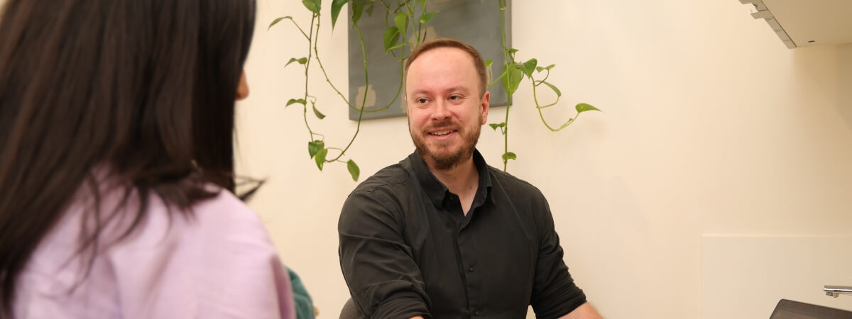 Melbourne chiropractor in discussion with a patient
