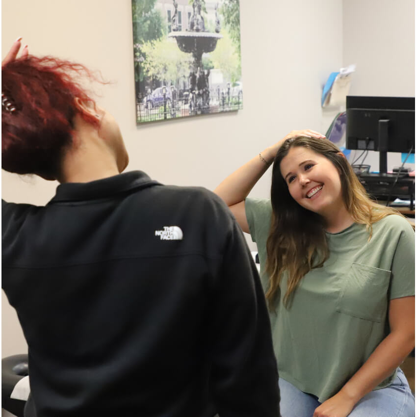patient and doc stretching their neck
