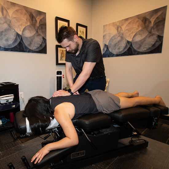 Upper-back adjustment for female patient