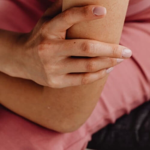 Woman with elbow pain
