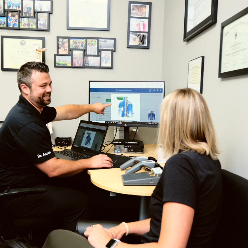 doctor showing a patient scans