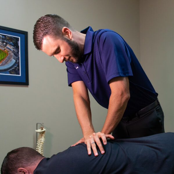 acupuncture needles in womans back