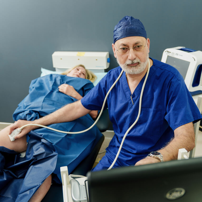Dr Aziz scanning patient