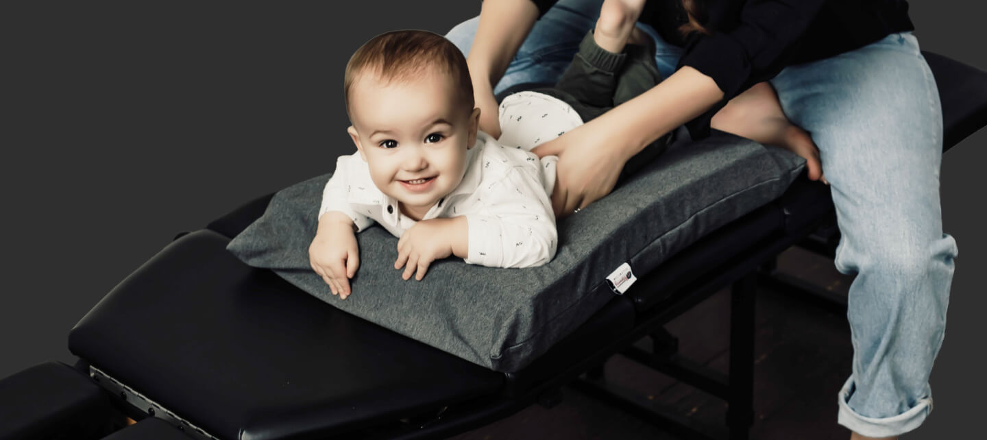 Smiling baby treated with Chiropractic Care