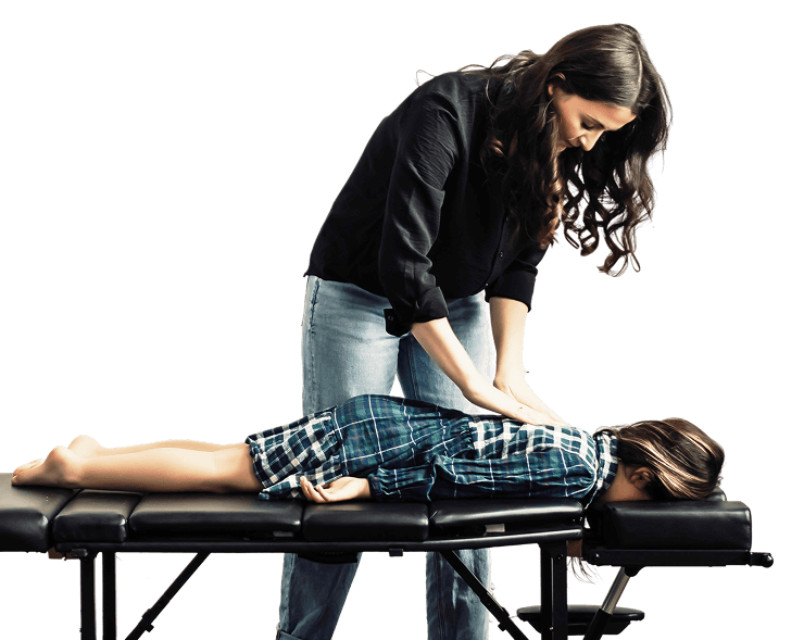Young female patient receiving a chiropractic adjustment