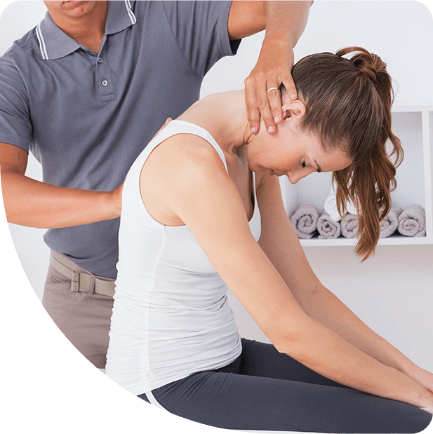 chiropractor adjusting back