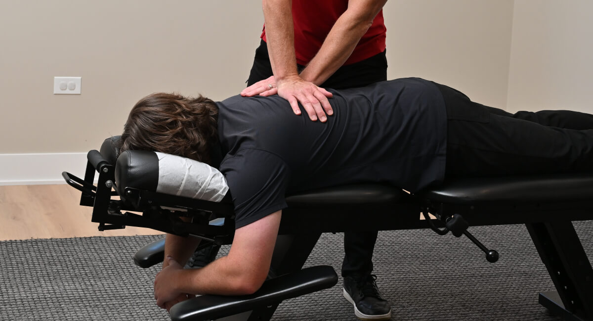 South Elgin patient receiving a chiropractic adjustment