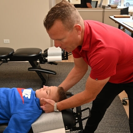 Gentle neck adjustment for pediatric patient
