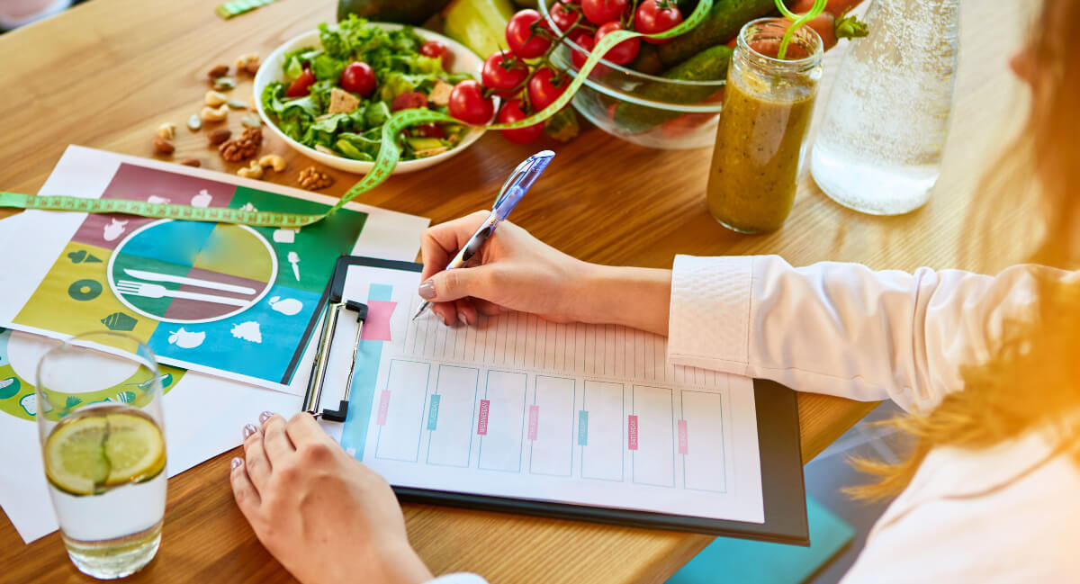 Nutritionist planning out meals