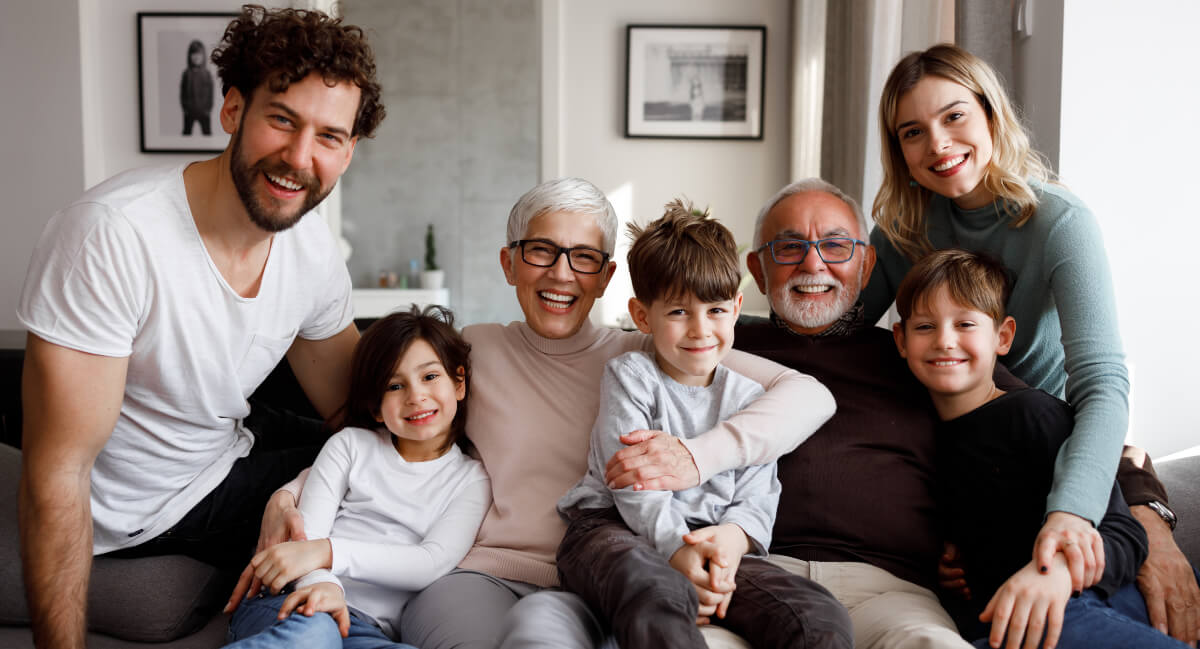 Smiling multi-generational family