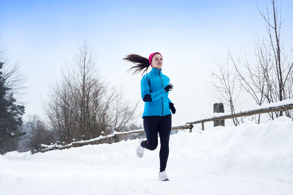 graphicstock-athlete-woman-is-running-during-winter-training-outside-in-cold-snow-weather_HR3lhoMXiWb
