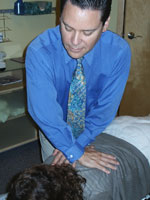 Dr. Cohn adjusting patient