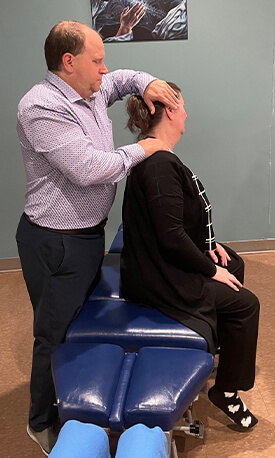 Dr adjusting a patient