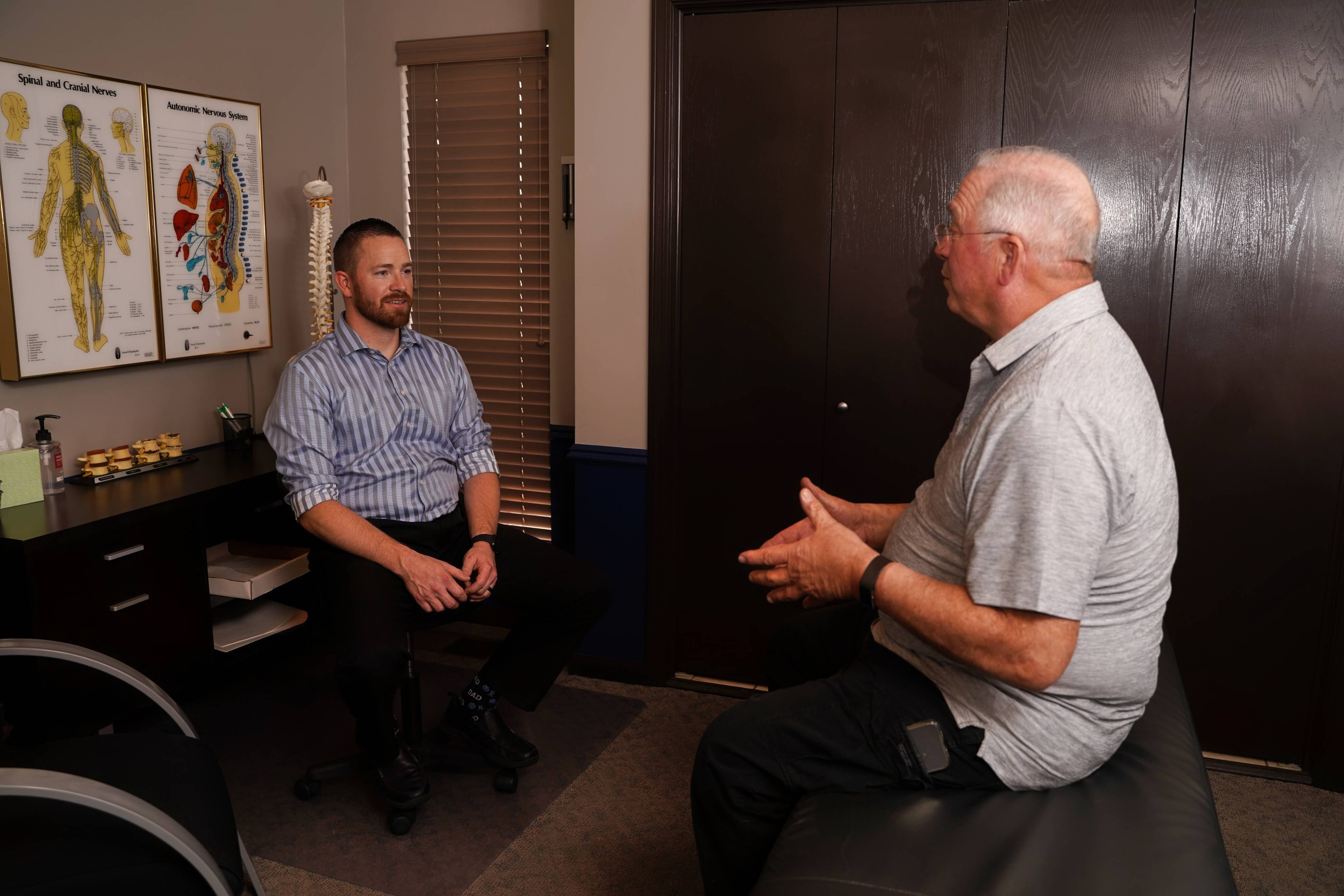 Yuba City chiropractor Dr. Funk in consultation with a patient