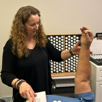 practitioner doing nutritional testing