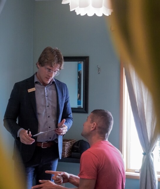 Sioux Falls chiropractor Dr Snyder talking with a patient