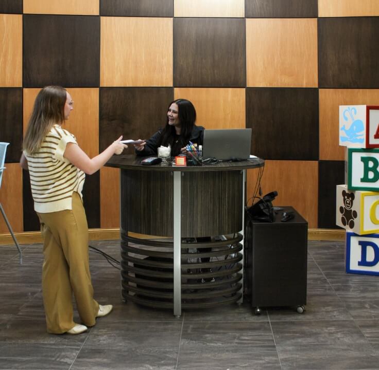 Envive patient at our reception desk