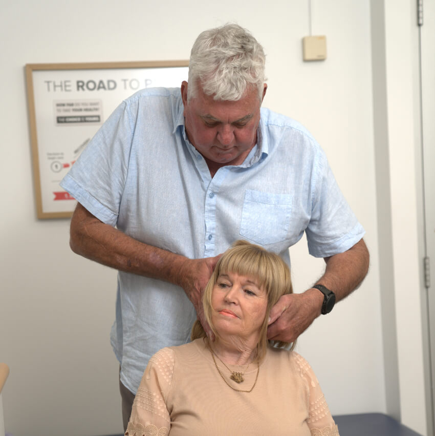 Dr Mark adjusting patients neck