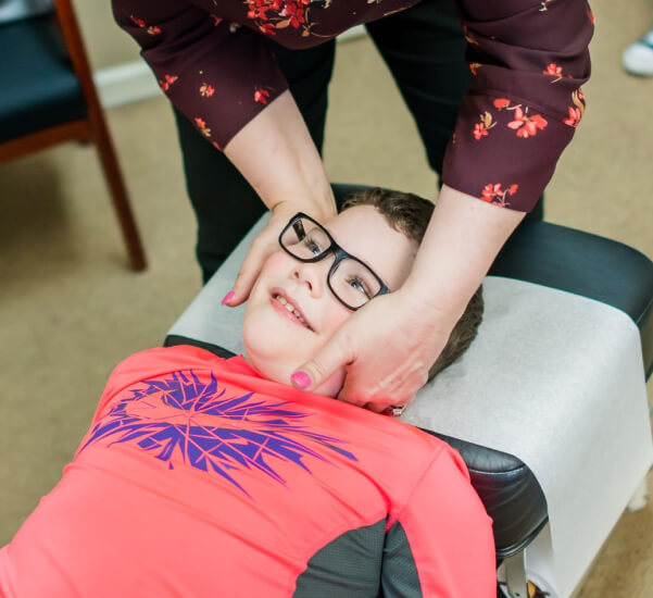 adjusting child's neck