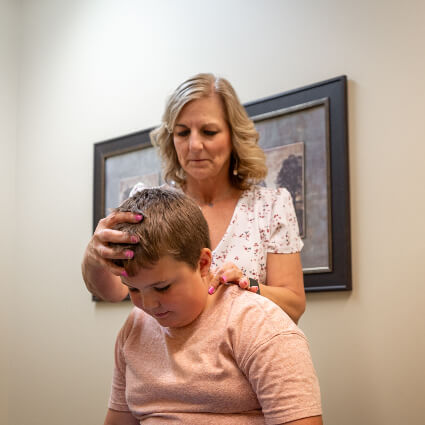 Adjusting child's neck