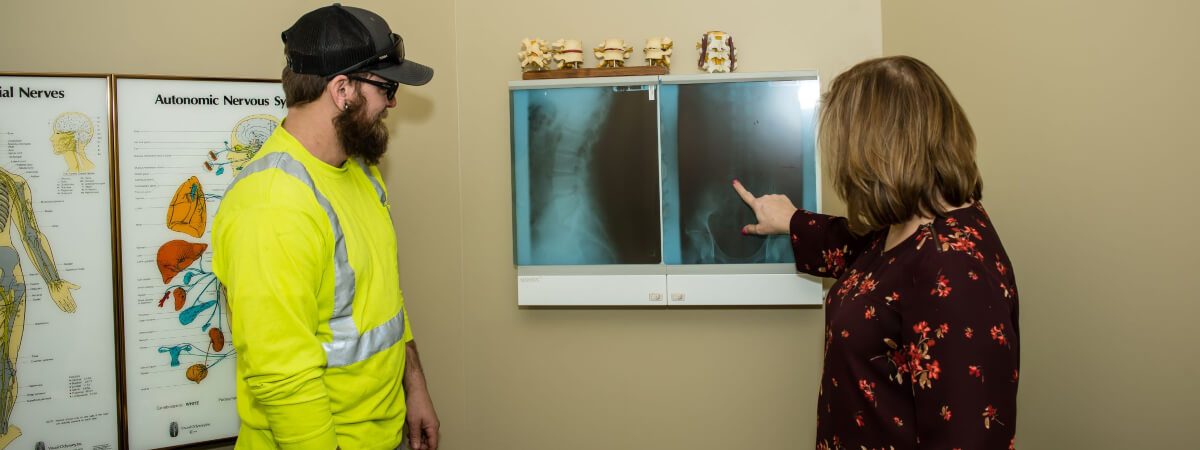 Ottawa patient in a chiropractic consultation at Ottawa Chiropractic Clinic