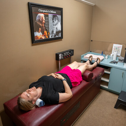 woman on spinal decompression machine
