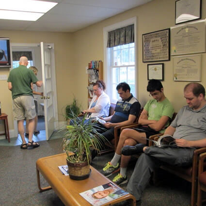 People sitting in waiting room