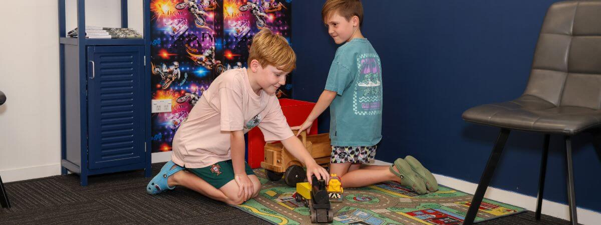 Children playing with toys at Health-Performance Chiropractic