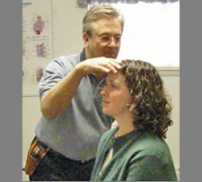 Dr. Fedon adjusts a patient.