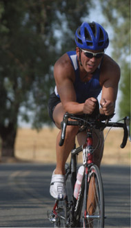 Dr. Hoffart competing in cyclist competition.