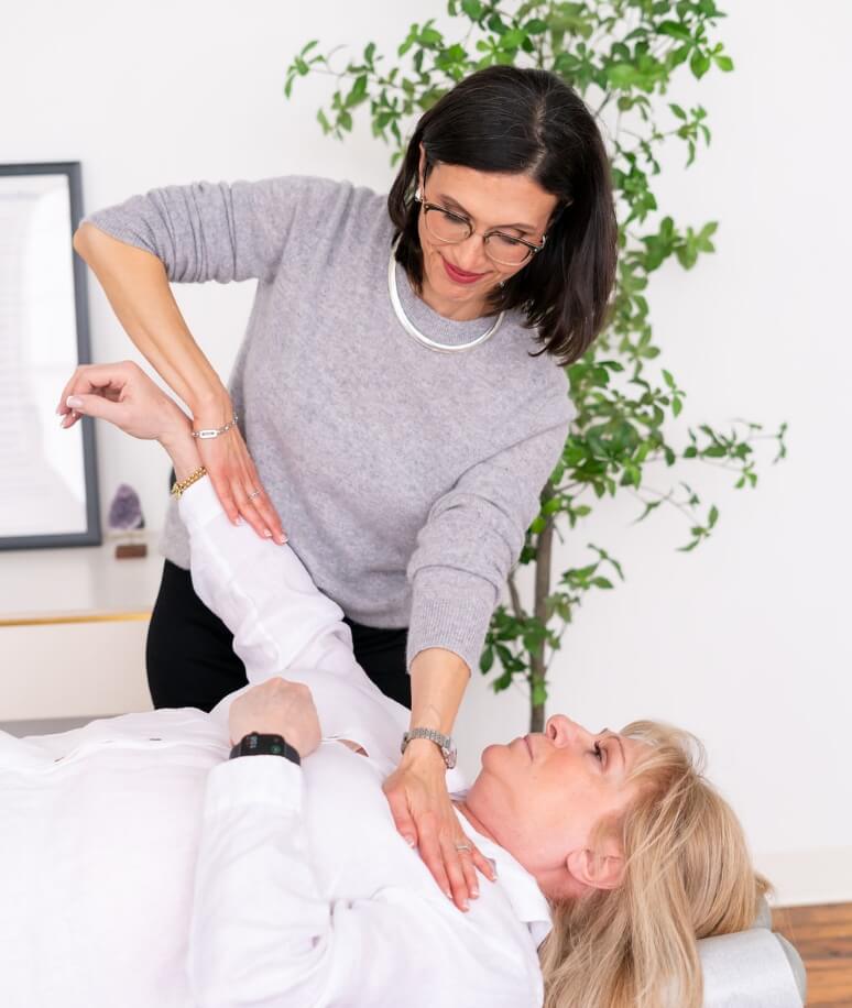 Mahopac chiropractor Dr Jodi adjusting patients arm