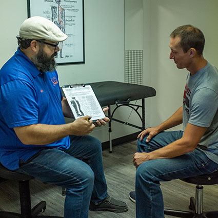 Doctor talking to patient