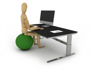 Good ergonomics: figure at stability ball workstation