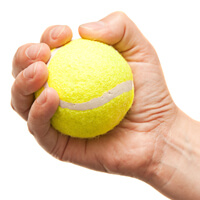 Tennis ball grip