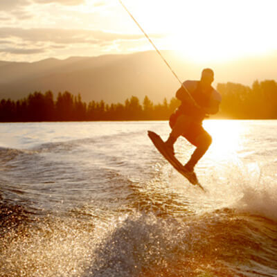 Wakeboarder at sunset