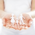 womans-hands-with-family-cutout