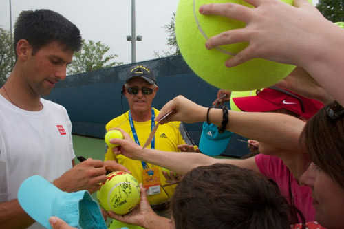 Novak Djokovic signing autographs