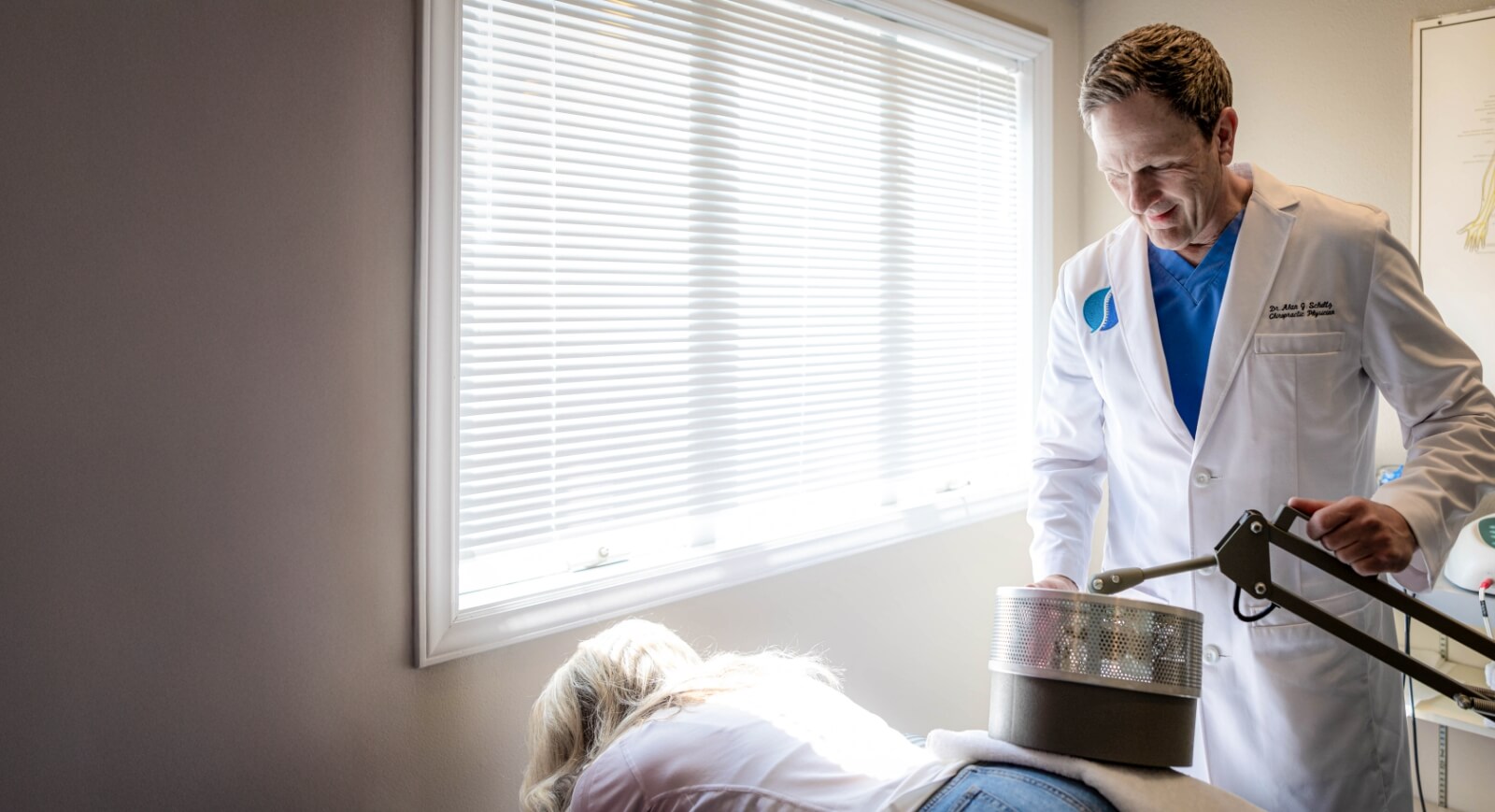 Johnston chiropractor Dr Schultz adjusting tool to use on patients back