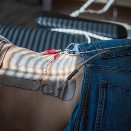 closeup of patient during e-stim treatment