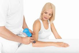 Woman being treated for elbow pain