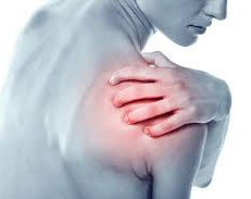 Woman experiencing shoulder pain